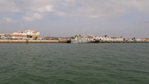 Naval boat on the river on a cloudy day Stock Footage 285139725