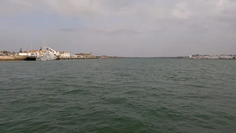Naval boat on the river under a cloudy sky Stock Footage 285139335