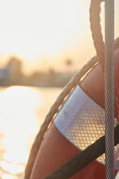 Naval floating device with the sunset in the background Stock Photos