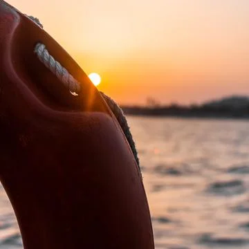 Naval floating device with the sunset in the background 写真素材
