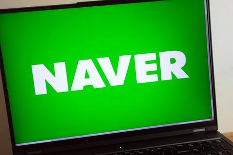 Naver online platform logo displayed on laptop Stock Photos