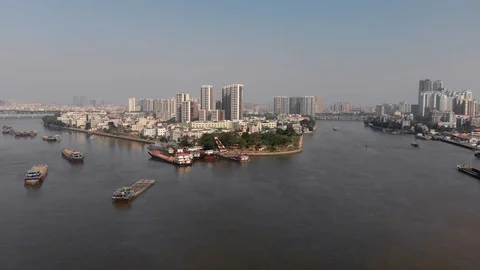 The navigable river diverges into two streams in the middle of a large Stock Footage 118244429