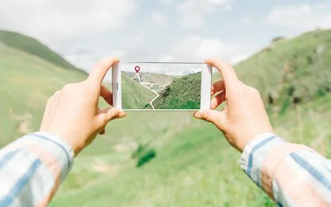 Navigating geolocation points in mountainous terrain. Stock Photos