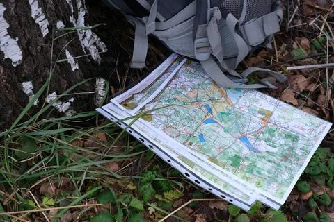 Navigating with map and compass Stock Photos