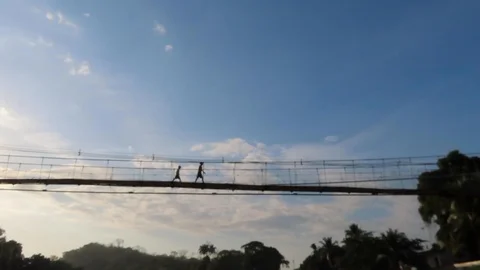 Navigating on a river passing under a bridge 2 Stock Footage 111234025