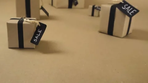 Navigating through gift boxes with sale tags Stock Footage 345479304