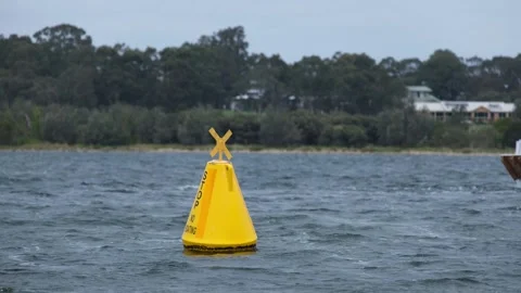 Navigation buoy marked with "STOP NO BOATING"  at Paynesville, Australia. Stock Footage 335965063