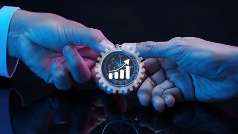 A navigation compass in hand with virtual of gear icon Stock Footage 240733259