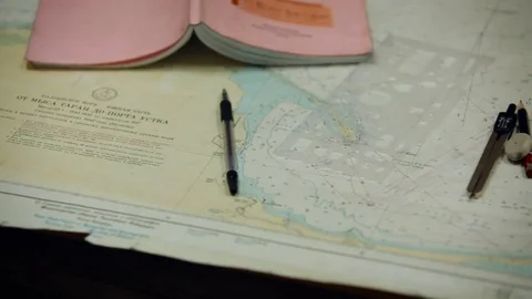 Navigation lessons. Map, pen, compass and calculations Stock Footage 84694881