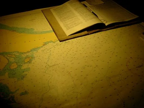 Navigation log on map Stock-Fotos