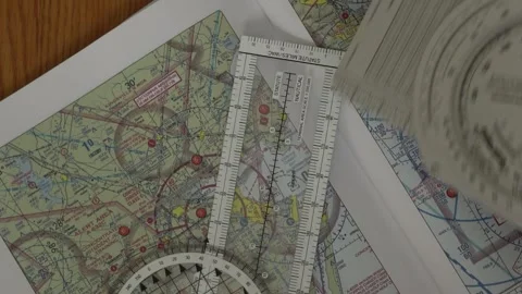 Navigation map and tools ae used to plot a vector to an airport Stock Footage 255625447