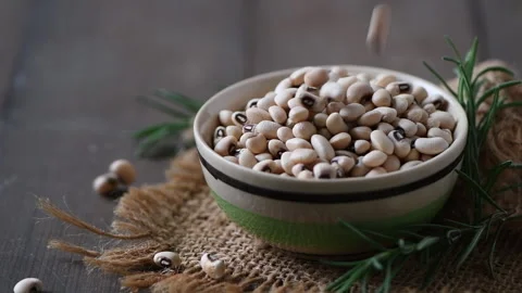 Navy bean or white kidneys beans on wood background. Stock Footage 253500317