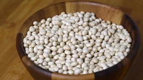Navy Bean, White kidney bean on wooden bowl Stock Footage 99962501