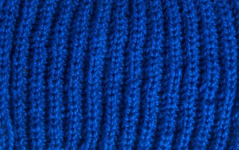 Navy blue background of soft, fleecy cloth. Texture of light dark denim nappy Stock Photos