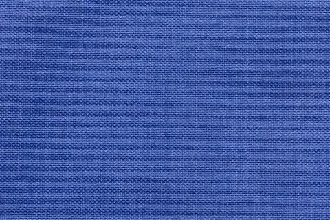Navy blue background from a textile material with wicker pattern, closeup. Stock Photos