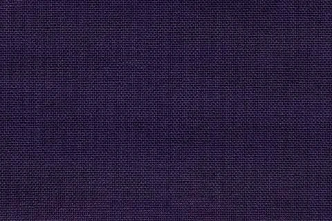 Navy blue background from a textile material with wicker pattern, closeup. Stock Photos