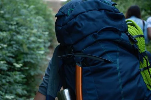 Navy blue backpack. View from front tourist traveler bag with forest backgrou Stock Photos