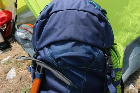 Navy blue backpack. View from front tourist traveler bag with forest backgrou Stock-Fotos