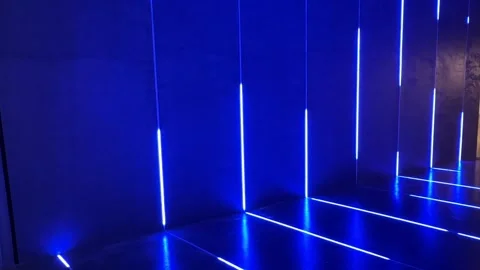 Navy-Blue Hall with Moving Light Strips Creating a Futuristic Ambiance Stock Footage 303369276