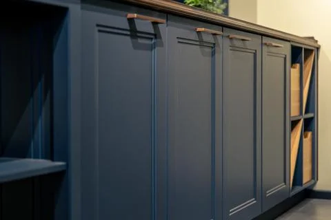 Navy blue kitchen modules for storage. System with wooden boxes and open sh.. Stock Photos