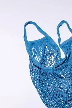 The navy blue string bag was shot in macro style on a white background Stock Photos