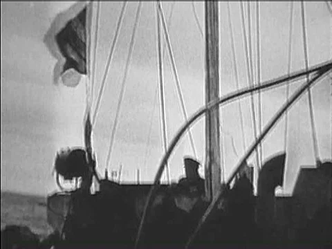 The Navy bombards the coast of Normandy as part of the D-Day invasion in 1944. Stock Footage 75790836
