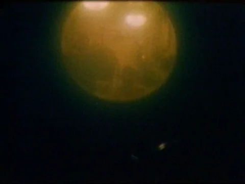 Navy divers work inside of Sea Lab II and test their blood pressure in theƒ Stock Footage 75298988