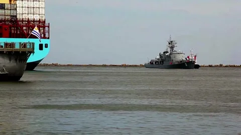Navy Frigate slowly making int’s way into the Port of Santos in Brazil Stock Footage 253846377