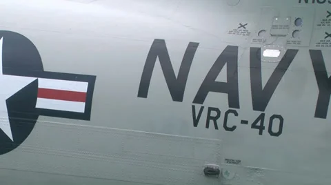 Navy Logo pan on jet fighter aircraft Stock Footage 39830403