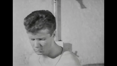 Navy man feel depressed after taking shower - 1945 Stock Footage 101407314
