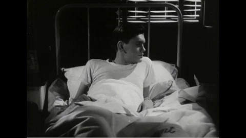 Navy man think about the paper and sleep on bed - 1945 Stock Footage 101407450