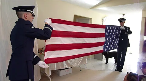 Navy Members Folding Flag Inside House Stock Footage 32676824