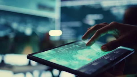 Navy operations specialist examines a world map with gps system on his tablet Stock Footage 276908221