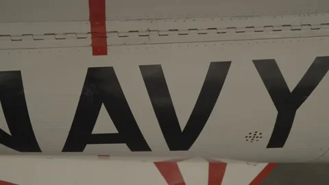 Navy painted on side of jet Stock Footage 218620070