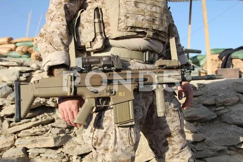 Navy Seal Holding Scar-17 Battle Rifle