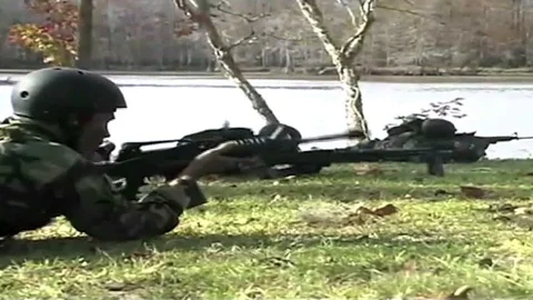 Navy SEALS special ops warcraft practice a river invasion exercise. Video stock 123366789