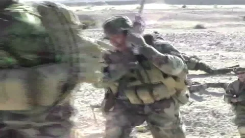 Navy SEALS train in live fire combat exercises with grenades and tear gas. Video stock 123368142