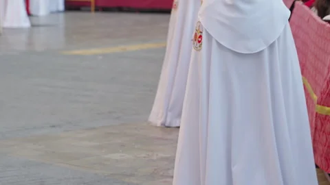 Nazareno participating in Holy Week procession in Spain 스톡 동영상 333957752