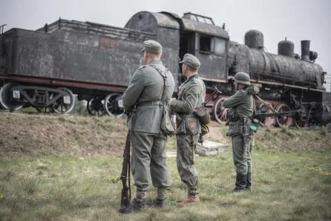 Nazis stand on the background of the train Stock Photos