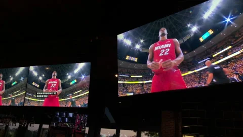 The NBA Finals Denver Nuggets Vs Miami Heat on Tv's at Sports Bar Stock Footage 242898326
