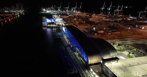 NCL Port Miami. 5k night aerial video Norwegian Cruise Line Stock Footage