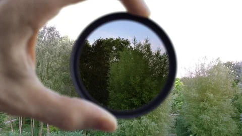 ND filter exposure adjust demonstration scanning (4K) Video stock 91967120