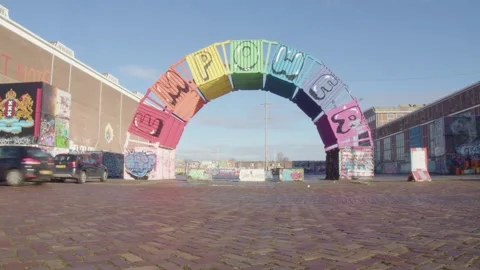 NDSM Werf arch made of sea containers at graffiti and event spot Amsterdam Stock Footage 297597986