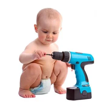 Ne-year old boy taking an interest in a screwdriver Stock Photos