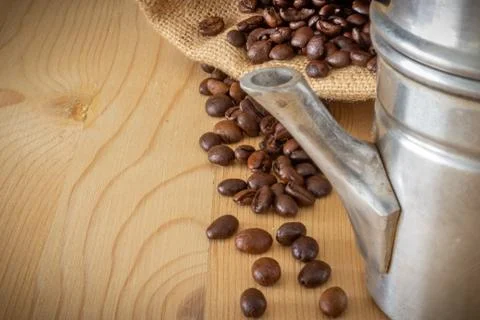 Neapolitan coffee machine, coffee beans and burlap sack Stock Photos