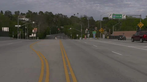 Near Empty Sunset Blvd and 405 Freeway North Covid 19 Stock Footage 136706925