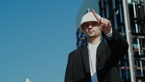 In the near future: a professional designer in a suit is working on an architect Vidéo 249263181
