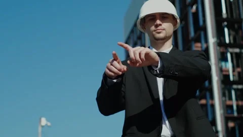 In the near future: a professional designer in a suit is working on an architect Stockbeeldmateriaal 249263199