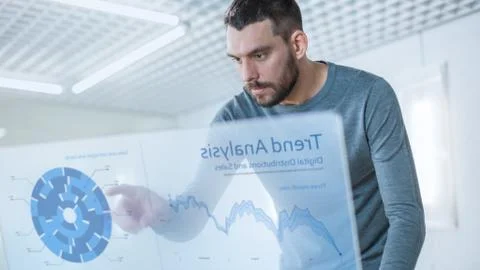 In the Near Future Stylish Man Using His High-Tech Computer with Transparent  Stock Photos
