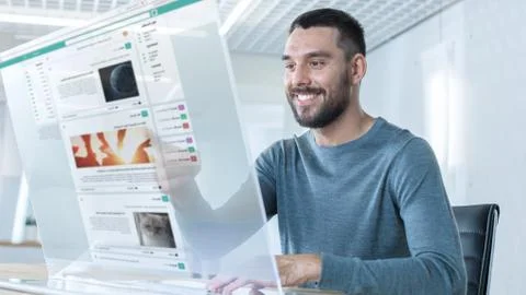 In the Near Future Stylish Man Using His High-Tech Computer with Transparent  Stock Photos